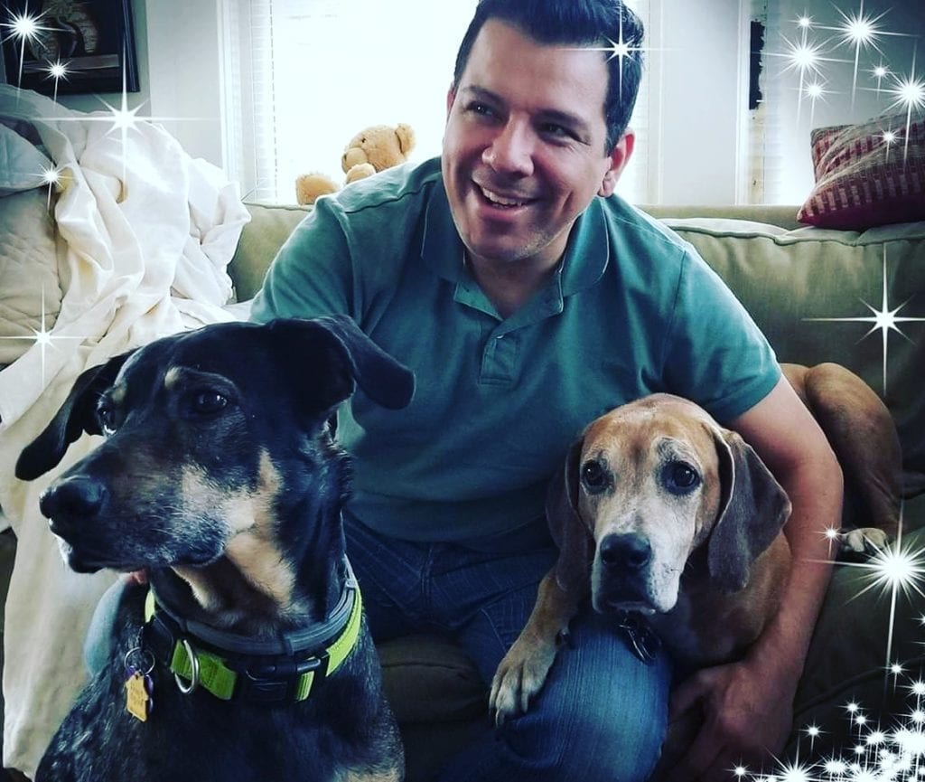 Ray with his 2 rescue rehabilitated dogs Benny & Tibby as they celebrate their 1st Christmas together